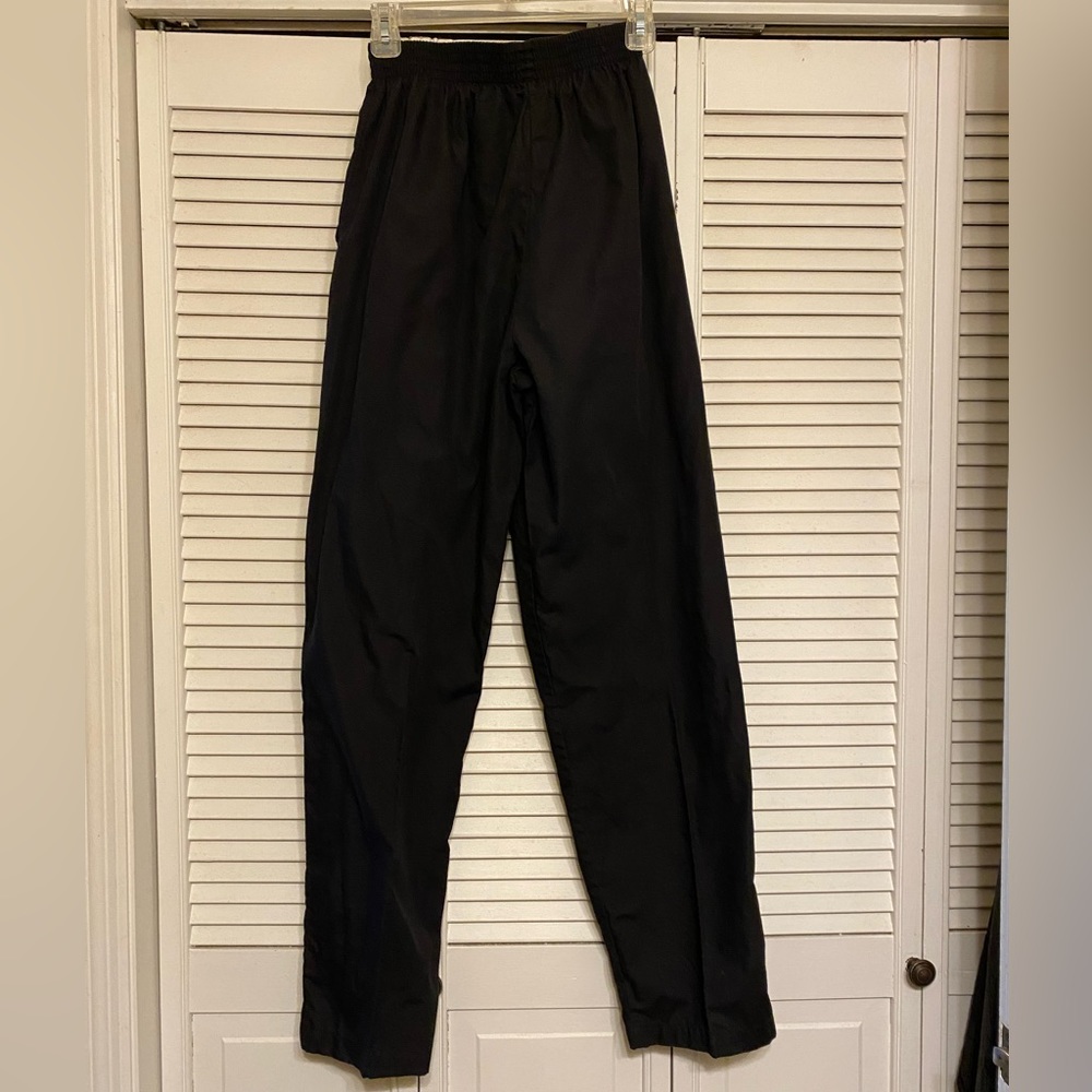 Landau scrub pant, med tall, elastic waist. 65% polyester, 35% cotton. Black